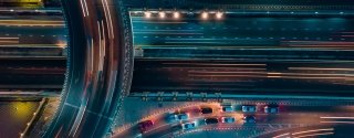 aerial view of highway nighttime time lapse